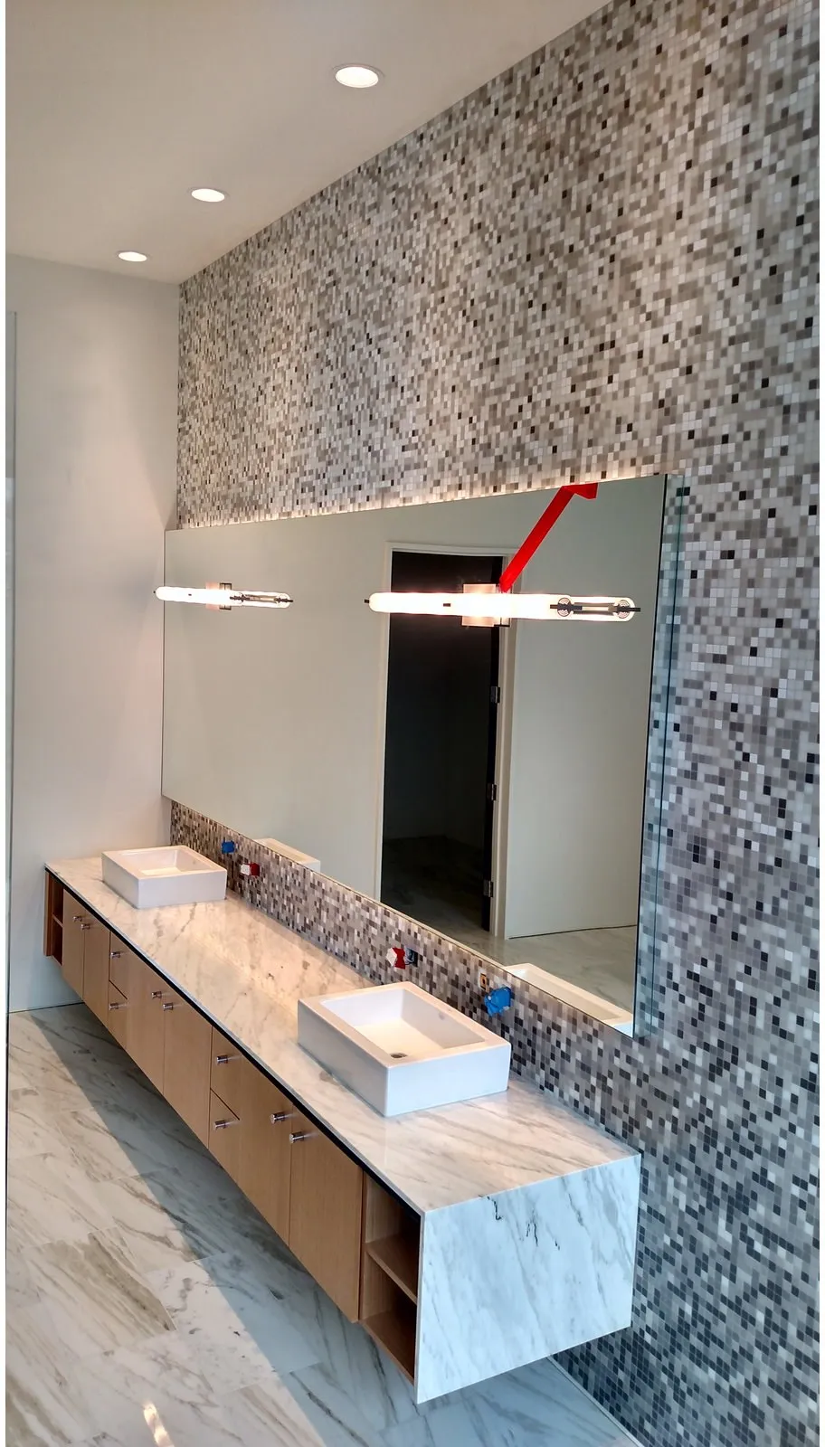 Contemporary remodel mid-installation, showing layout and dry-lay precision.